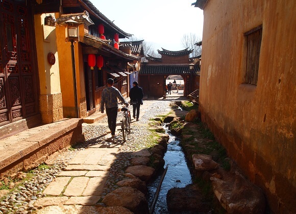 People walking in the ancient city of Shaxi