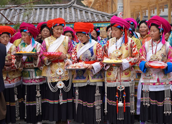 People dressed in costumes at a Tibetan festival